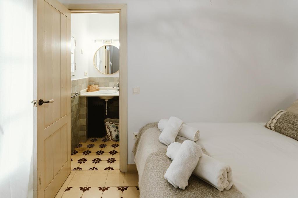 Postel nebo postele na pokoji v ubytování Ohliving Alhondiga