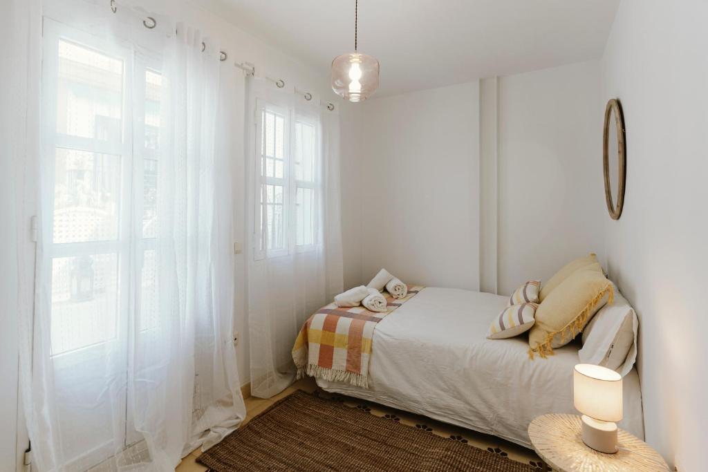 Postel nebo postele na pokoji v ubytování Ohliving Alhondiga
