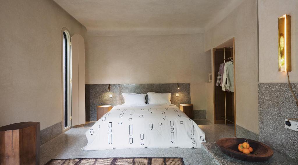 Postel nebo postele na pokoji v ubytování Maison Brummell Majorelle