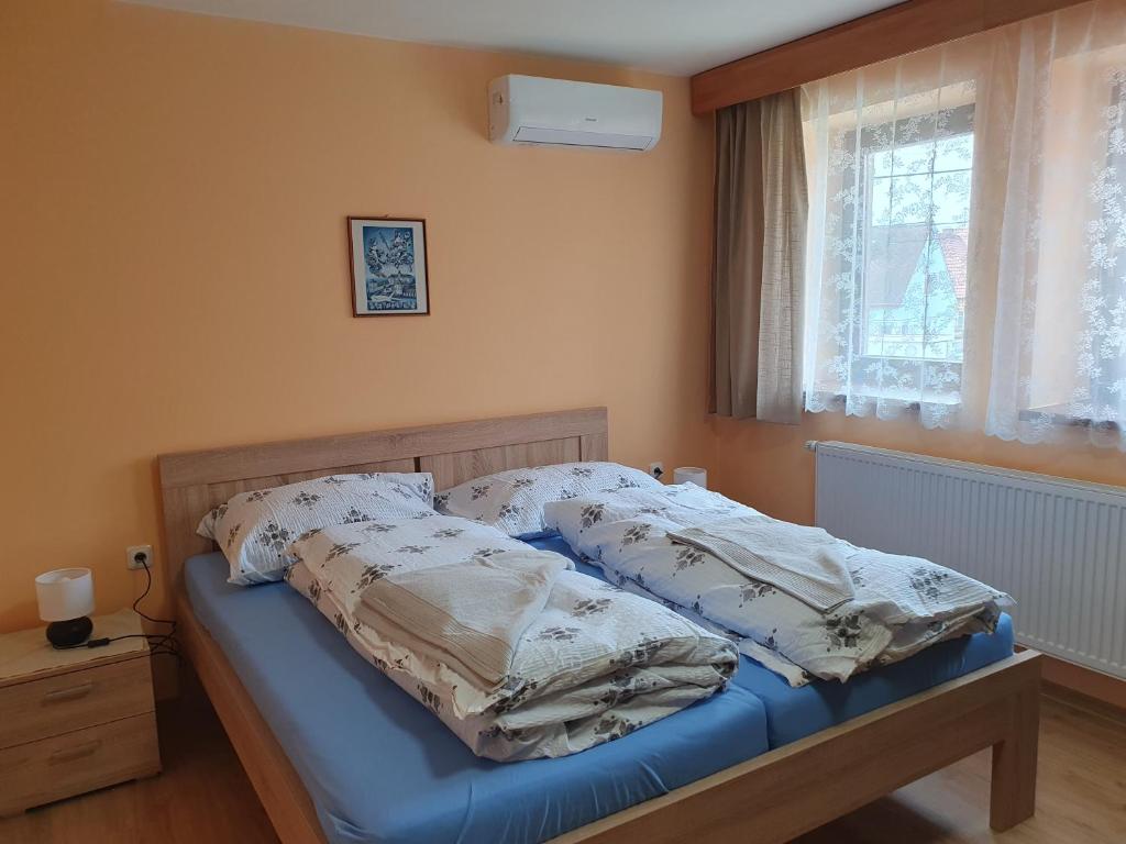 Postel nebo postele na pokoji v ubytování Pension Zelený strom