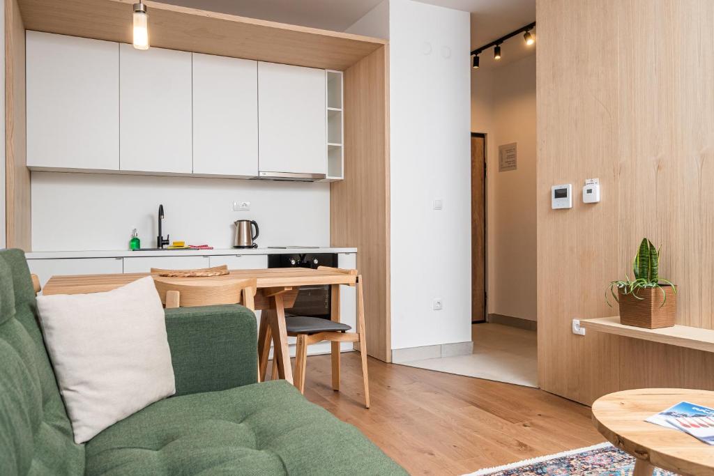 Kuchyň nebo kuchyňský kout v ubytování Aparthotel RAJSKA