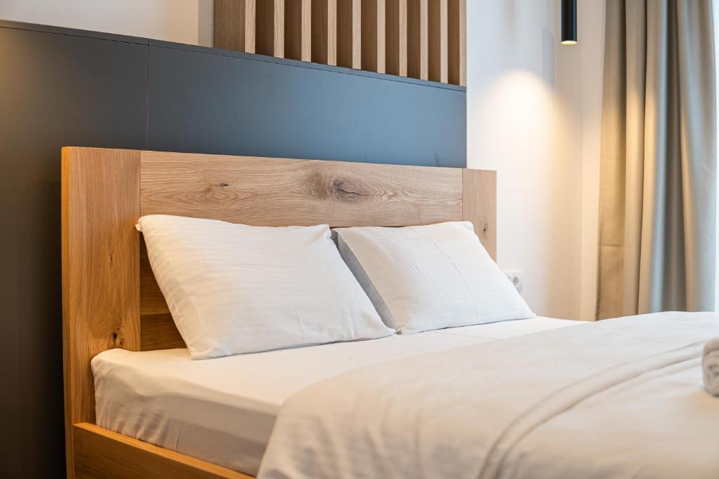 Postel nebo postele na pokoji v ubytování Aparthotel RAJSKA
