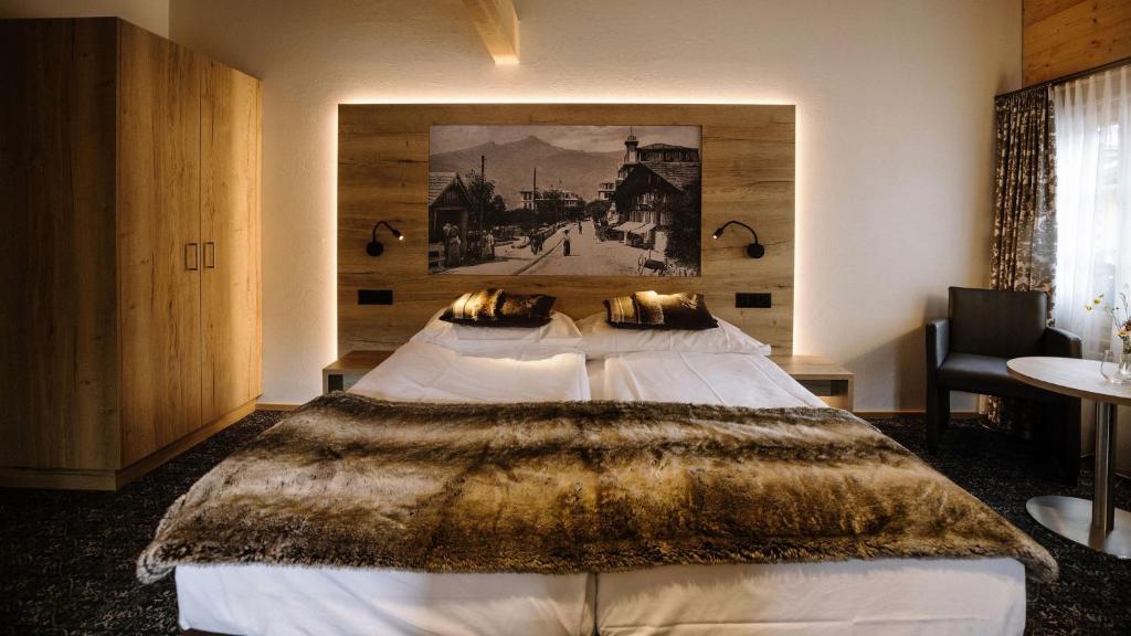 Postel nebo postele na pokoji v ubytování Hotel PINTE