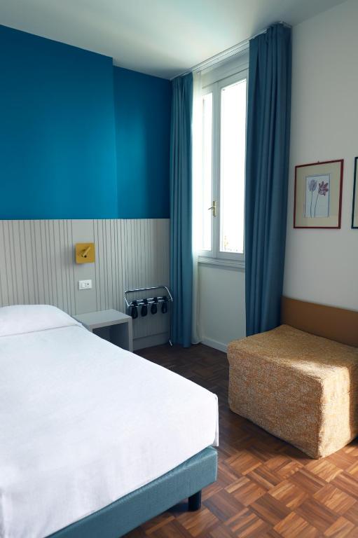Postel nebo postele na pokoji v ubytování Hotel Fonte Boiola