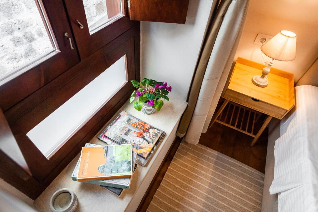 Postel nebo postele na pokoji v ubytování Mandorla Apartments