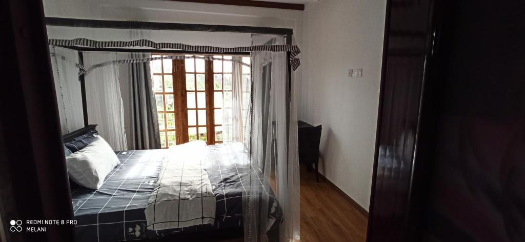 Postel nebo postele na pokoji v ubytování Mount Elegance