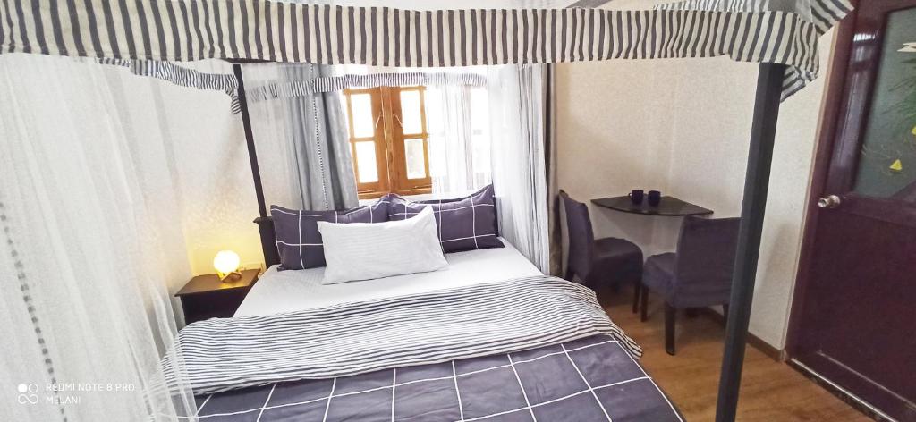 Postel nebo postele na pokoji v ubytování Mount Elegance