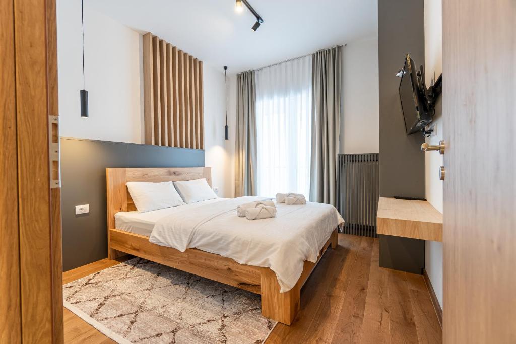 Postel nebo postele na pokoji v ubytování Aparthotel RAJSKA