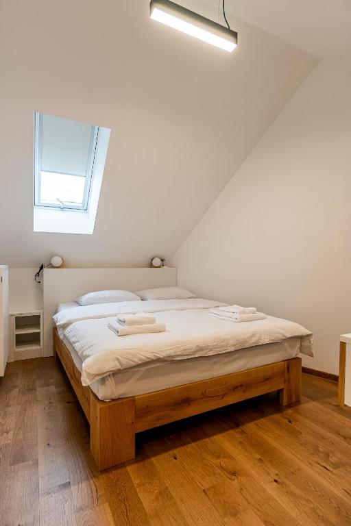 Postel nebo postele na pokoji v ubytování Aparthotel RAJSKA