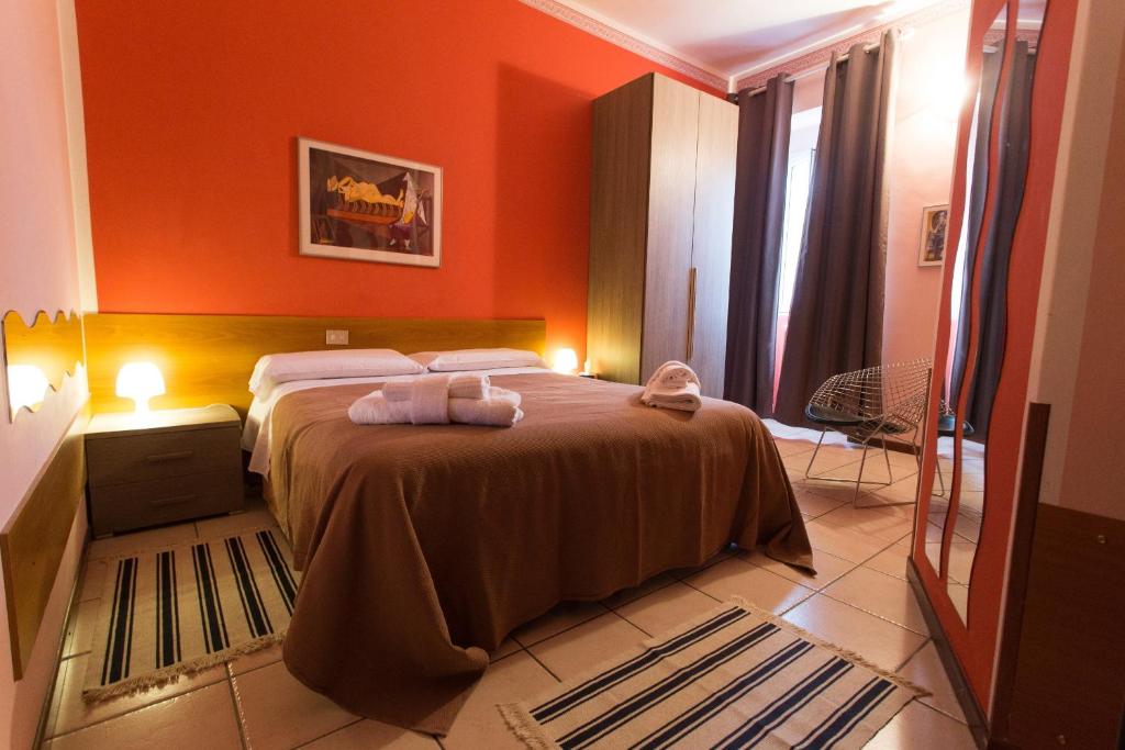 Postel nebo postele na pokoji v ubytování Hotel Pontenuovo