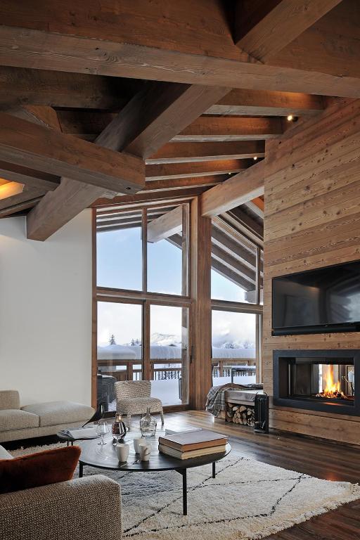 Area soggiorno di Chalet Le Moulin, Courchevel Le Praz, 6 chambres, Ski in, Ski out