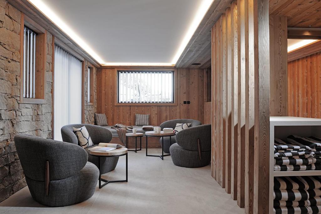 Area soggiorno di Chalet Le Moulin, Courchevel Le Praz, 6 chambres, Ski in, Ski out