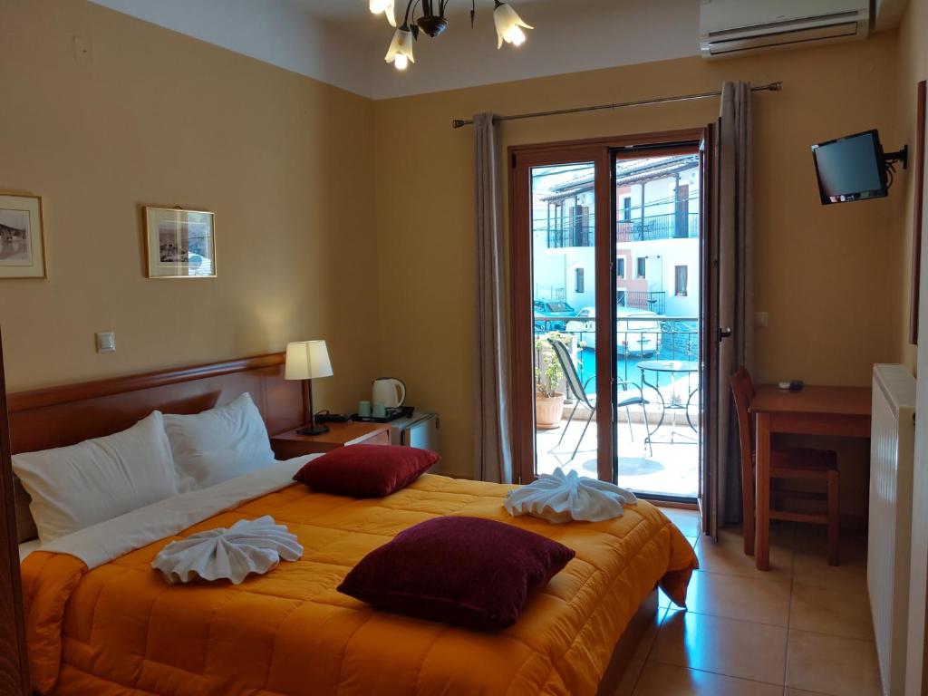Postel nebo postele na pokoji v ubytování Guesthouse Lithos