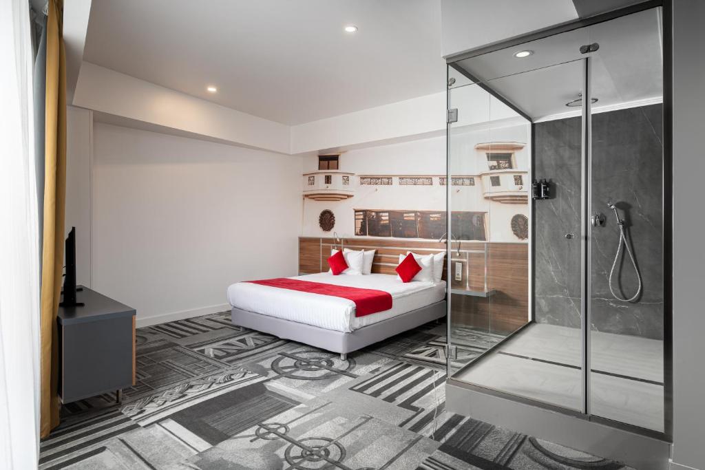 Postel nebo postele na pokoji v ubytování Mercure Bucharest Unirii