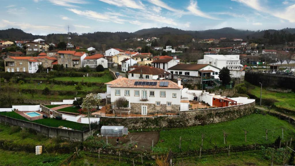Uma vista aérea de Coliving The VALLEY Portugal apartments with an office desk in each bedroom and a shared kitchen