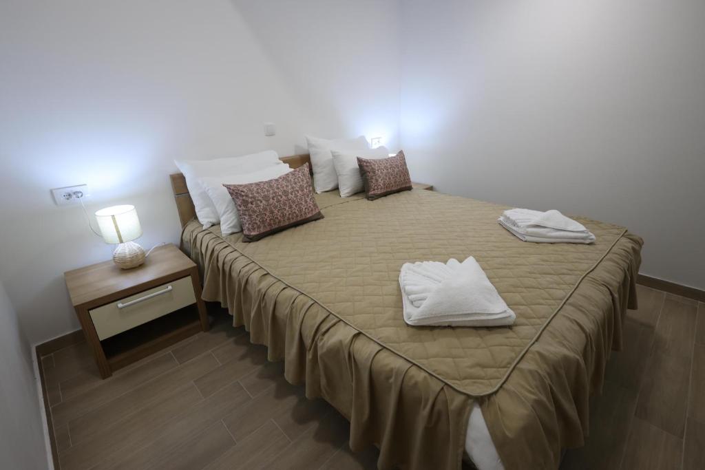 Postel nebo postele na pokoji v ubytování Konačište Grad B&B