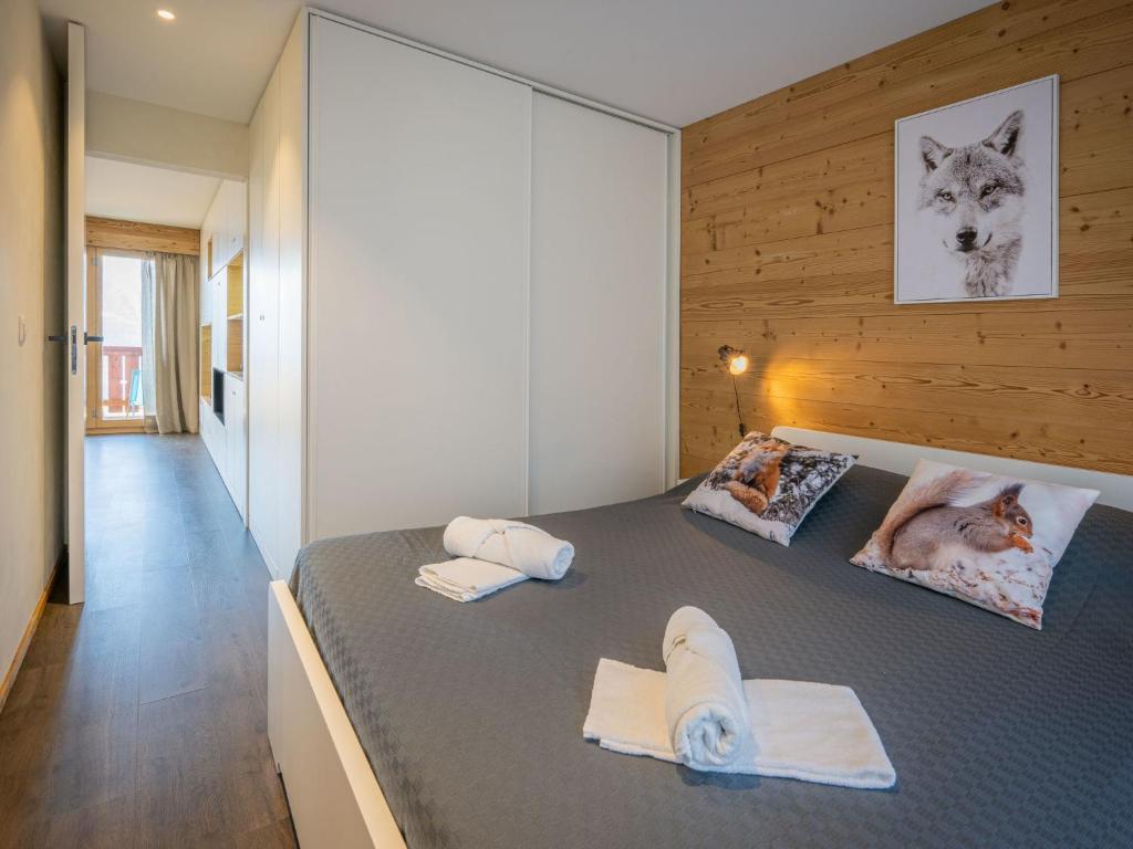 Postel nebo postele na pokoji v ubytování Apartment Plein Soleil A 9 by Interhome