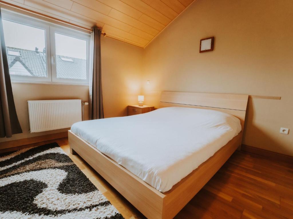 Postel nebo postele na pokoji v ubytování Apartment The Horseshoe by Interhome