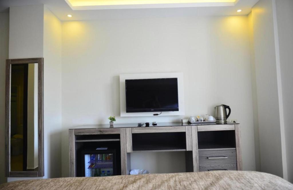 TV a/nebo společenská místnost v ubytování Moses Residence
