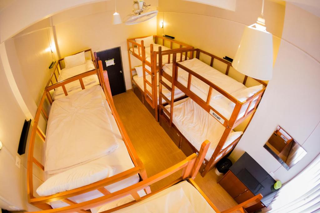 Postel nebo postele na pokoji v ubytování Pak-Up Hostel