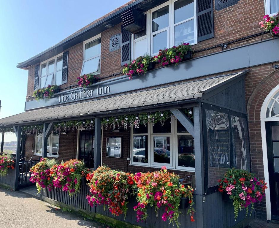 a building with flower boxes on the front of it at The Gather Inn in Brighton & Hove