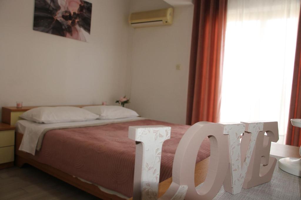 Postel nebo postele na pokoji v ubytování Motel "Tri lovca"