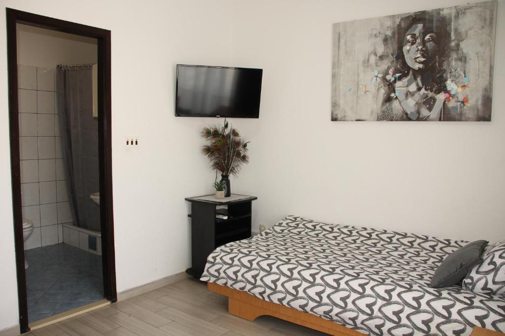 Postel nebo postele na pokoji v ubytování Motel "Tri lovca"