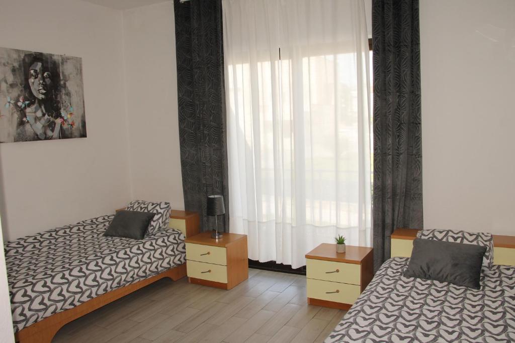 Postel nebo postele na pokoji v ubytování Motel "Tri lovca"