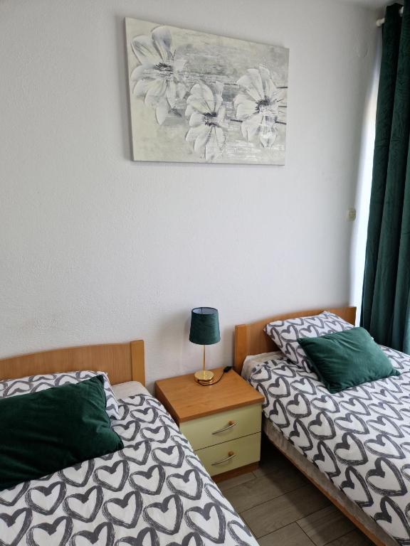 Postel nebo postele na pokoji v ubytování Motel "Tri lovca"