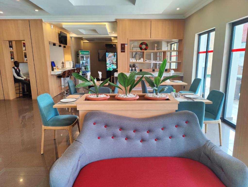 Χώρος καθιστικού στο Ivy Hotel Emerald