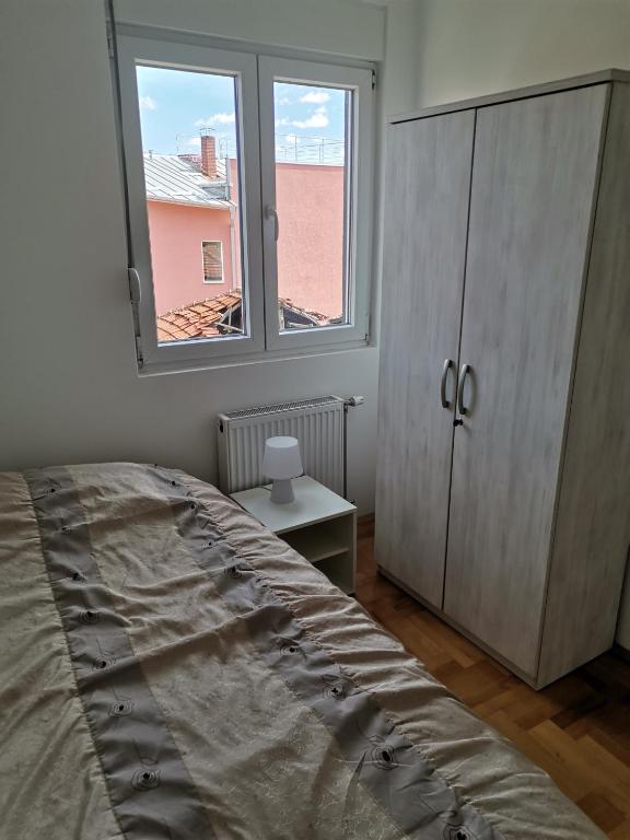 Postel nebo postele na pokoji v ubytování Nikolici - Free Parking