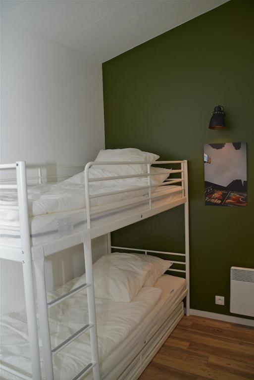 Łóżko lub łóżka w pokoju w obiekcie Villa 1