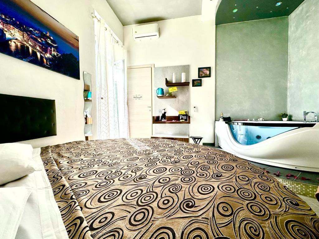 TV a/nebo společenská místnost v ubytování Il Quadrifoglio guesthouse