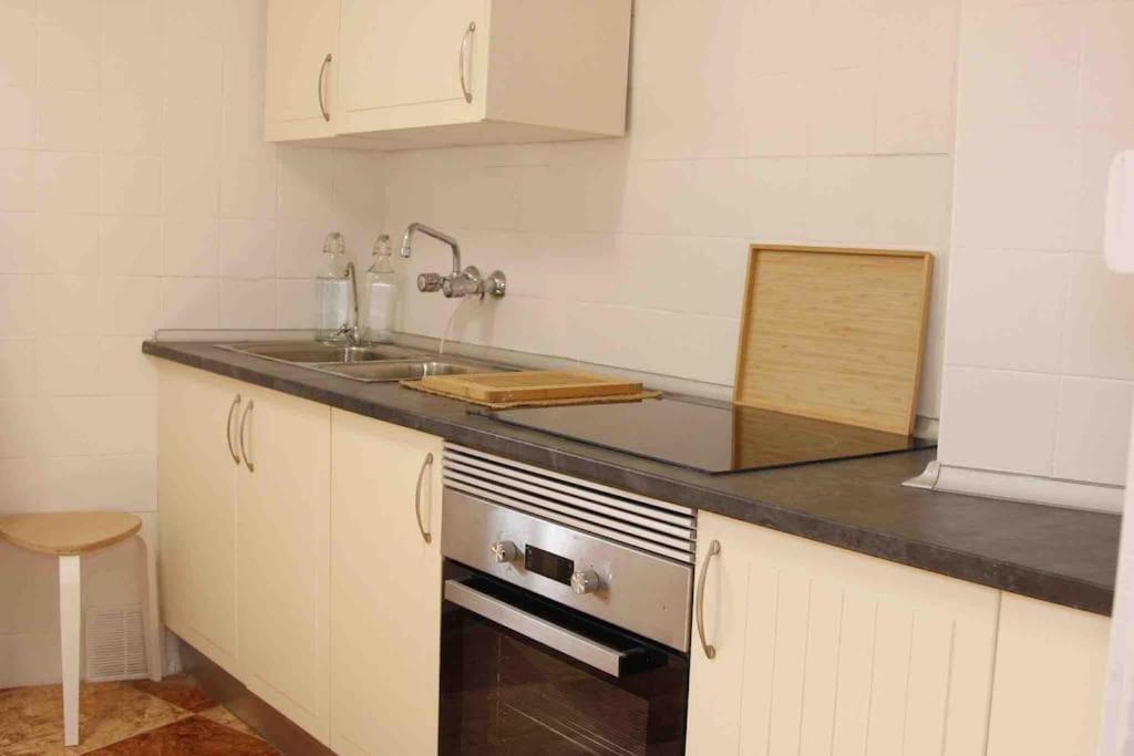 Kuchyňa alebo kuchynka v ubytovaní Casa Malagueña a pie de playa