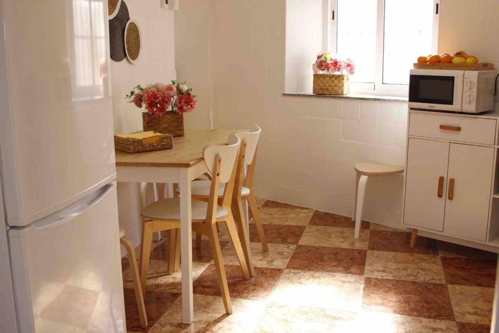 Kuchyňa alebo kuchynka v ubytovaní Casa Malagueña a pie de playa