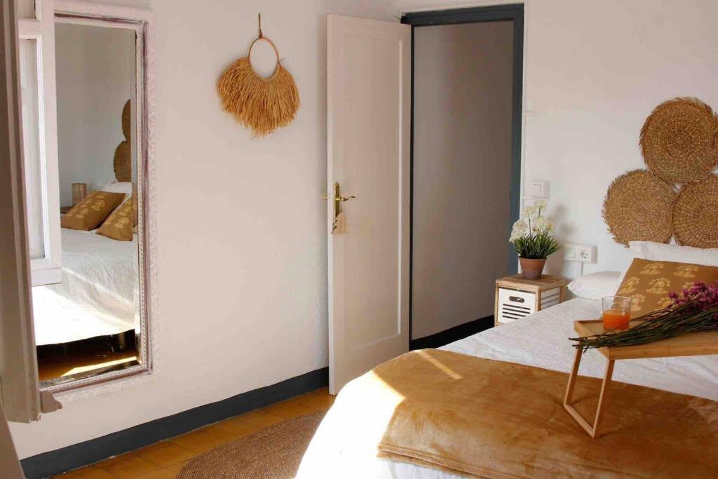 Posteľ alebo postele v izbe v ubytovaní Casa Malagueña a pie de playa