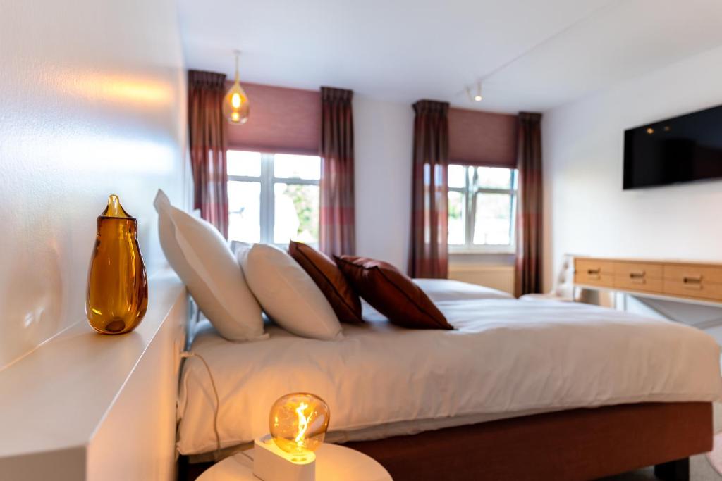 Postel nebo postele na pokoji v ubytování B&B Tabibito
