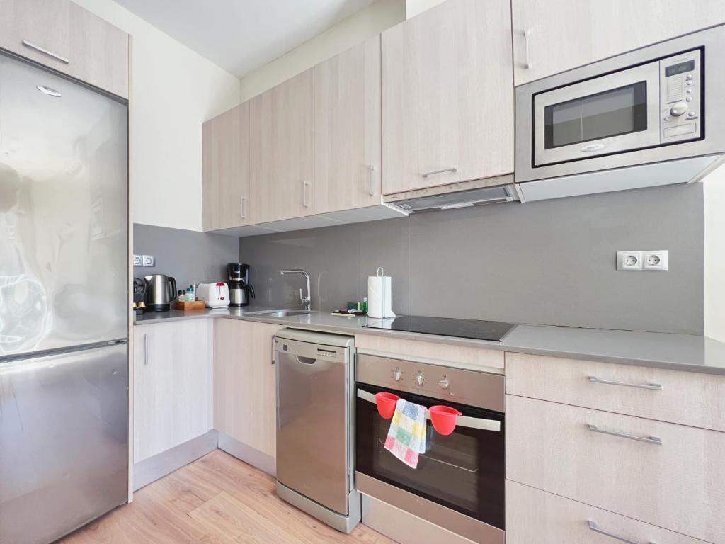 Kuchyňa alebo kuchynka v ubytovaní Stay U-nique Apartments Fontanella
