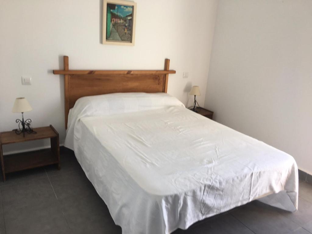 A bed or beds in a room at LIOMA VELLA 1