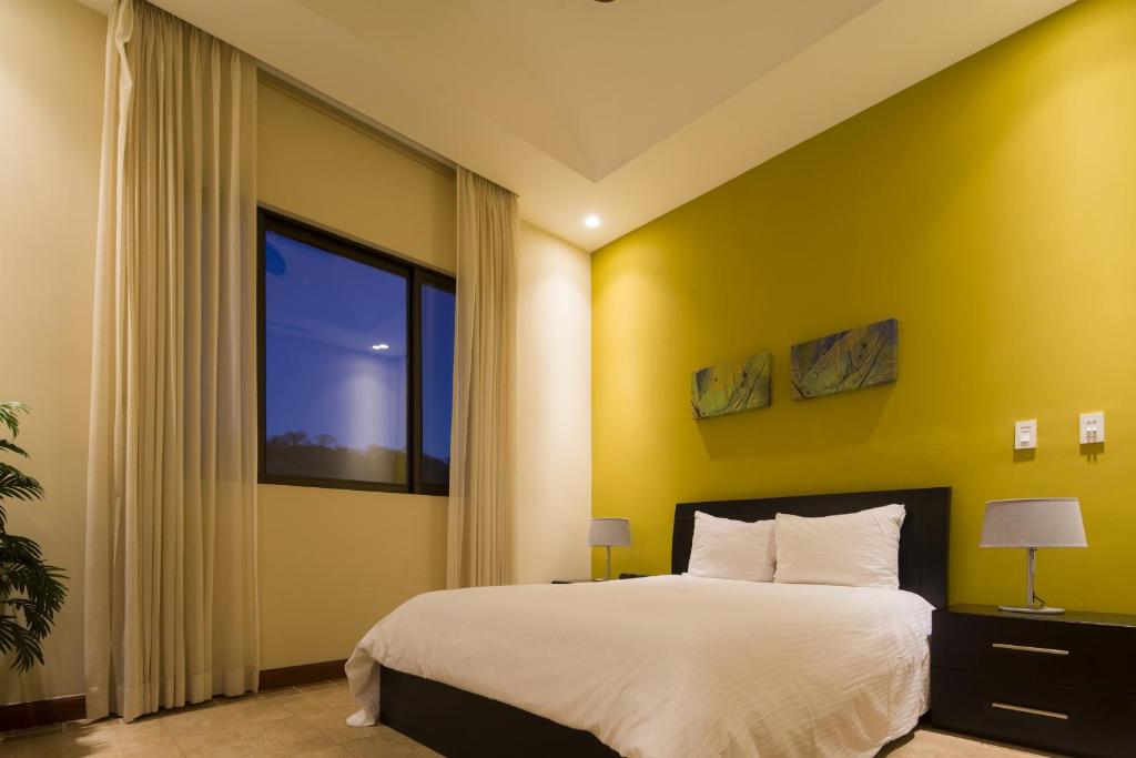 Postel nebo postele na pokoji v ubytování Jobo 7 Luxury Penthouse - Reserva Conchal