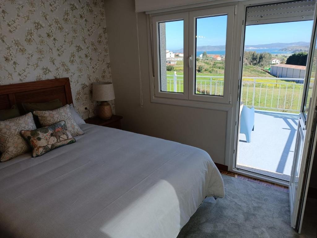 Posteľ alebo postele v izbe v ubytovaní Casa do Rancho