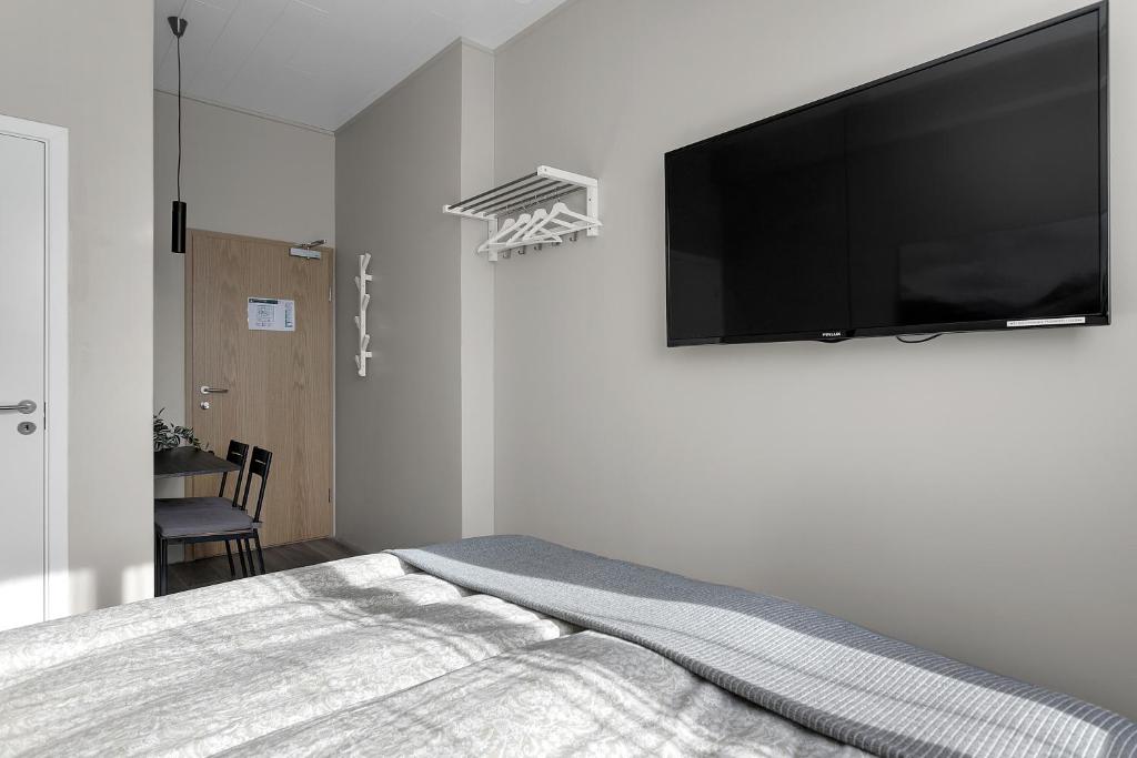 TV a/nebo společenská místnost v ubytování NN Urban Guesthouse