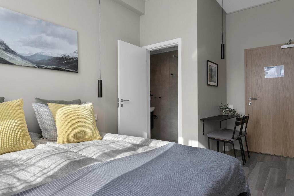 Postel nebo postele na pokoji v ubytování NN Urban Guesthouse