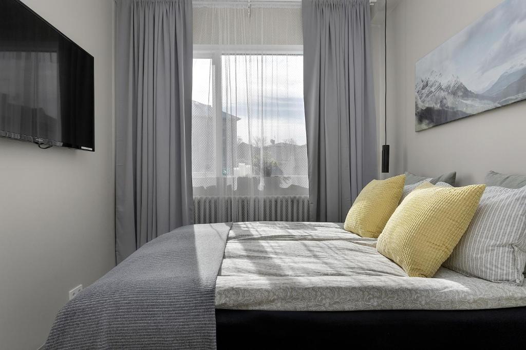 Postel nebo postele na pokoji v ubytování NN Urban Guesthouse