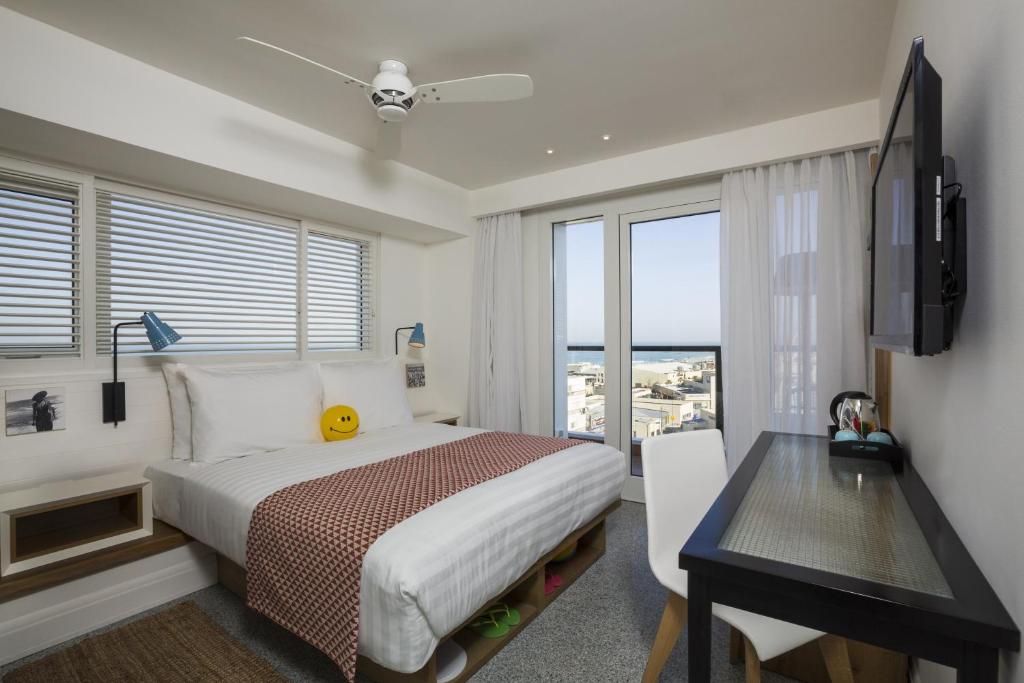 TV a/nebo společenská místnost v ubytování Yam Hotel - an Atlas Boutique Hotel