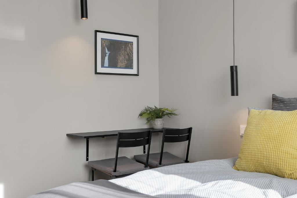 Postel nebo postele na pokoji v ubytování NN Urban Guesthouse