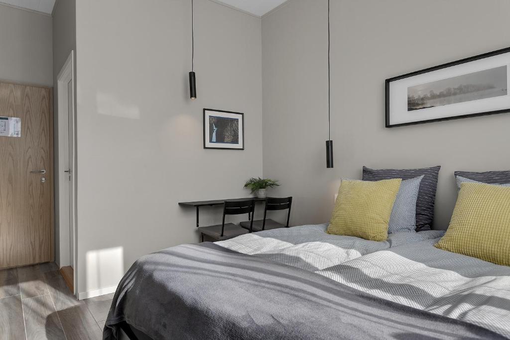Postel nebo postele na pokoji v ubytování NN Urban Guesthouse