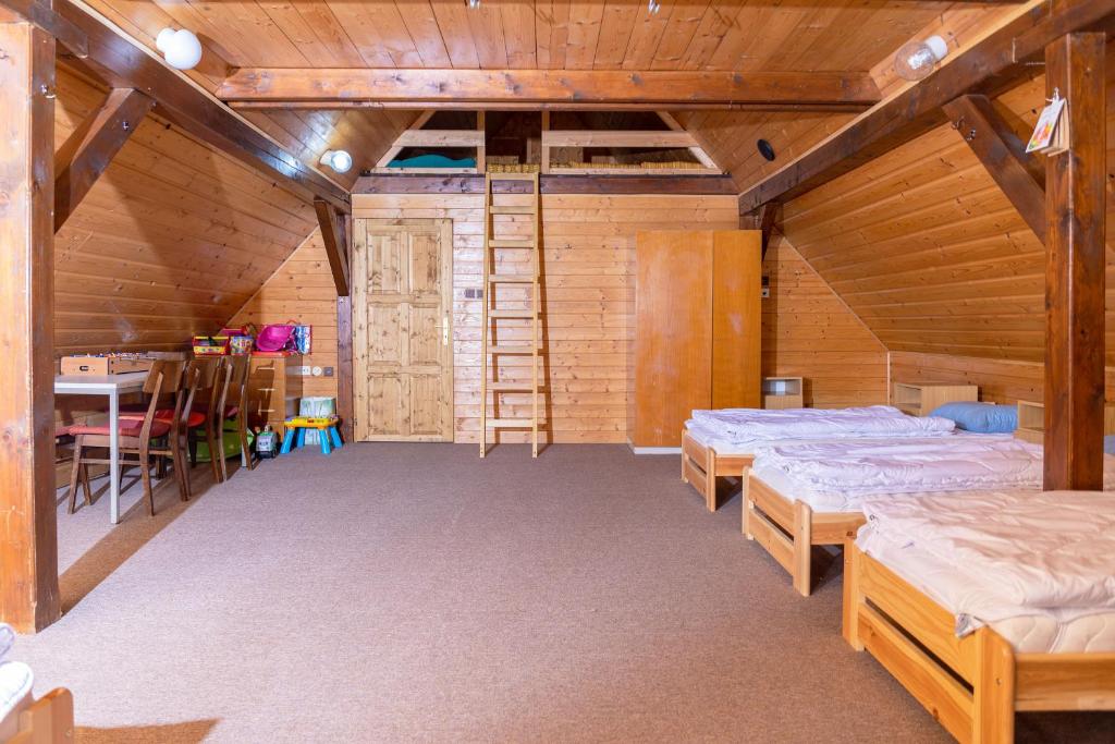 Postel nebo postele na pokoji v ubytování Chalupa Na Paloučku