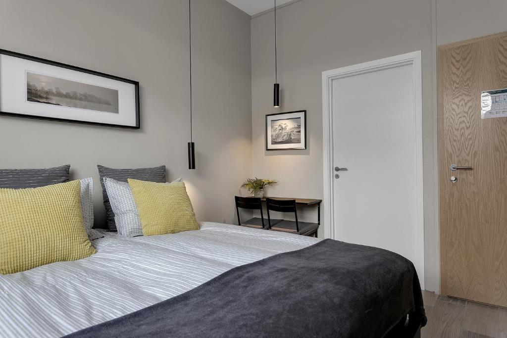 Postel nebo postele na pokoji v ubytování NN Urban Guesthouse