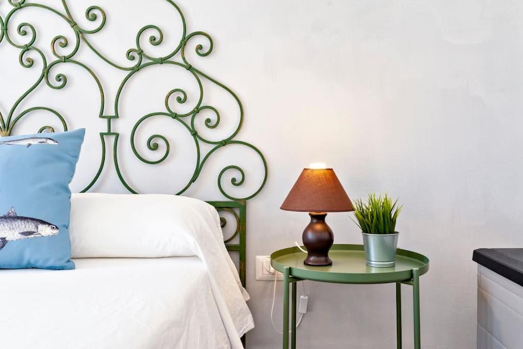 A bed or beds in a room at Cozy Flat and Terrace - 2 min from the beach by Sweet Home Puglia Apartments